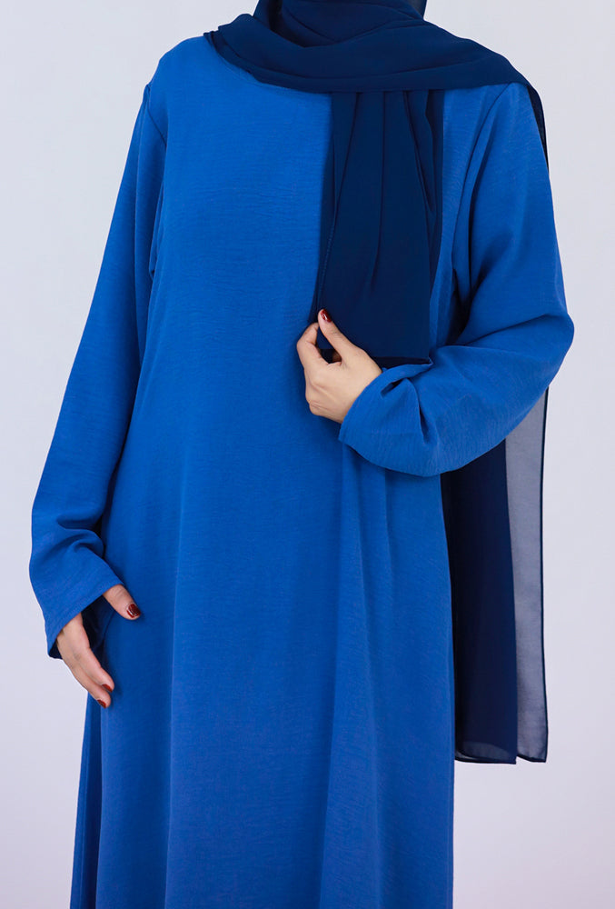 Blue Kira loose slip dress with pockets in maxi length and with long sleeve - ANNAH HARIRI