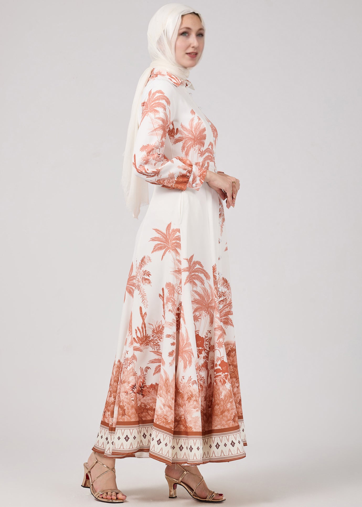 Detailed view of button-down front on Serafina Maxi Dress with vintage palm print