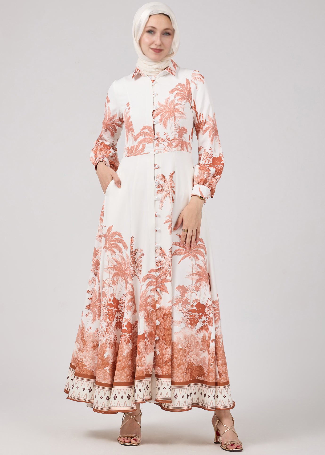 Serafina Maxi Dress by Annah Hariri, front view showcasing desert palm print and button-down design