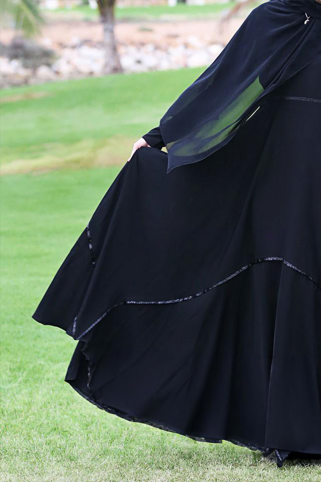 Abaya with an adjustable belt for fit