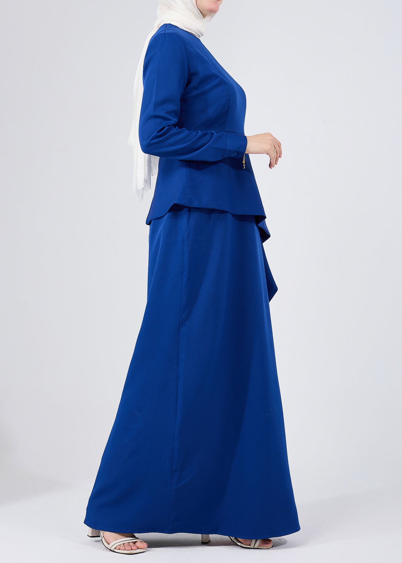 Side view of Asymmetric Peplum Maxi Dress in Royal Blue