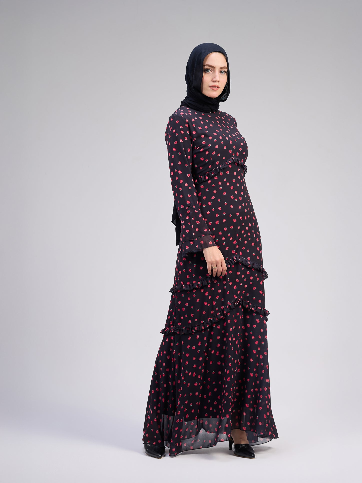 Back view of modest black chiffon maxi dress with a flowy silhouette