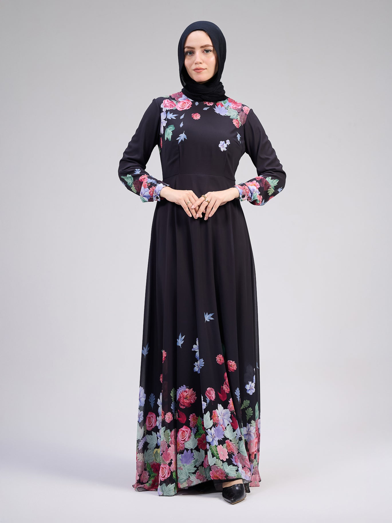 Full-length back view of chiffon floral print maxi dress