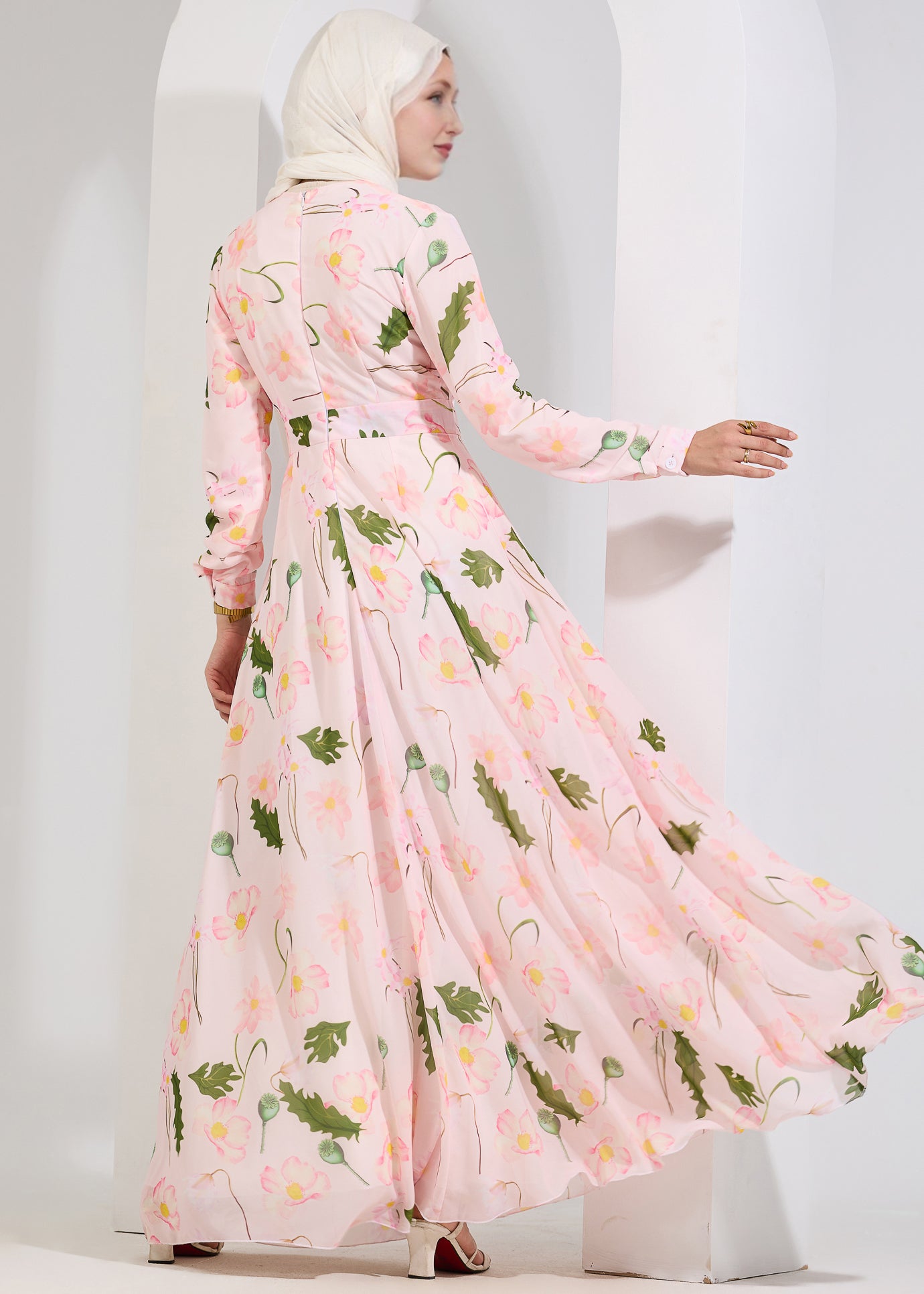 Back view of blush floral chiffon maxi dress with floral print