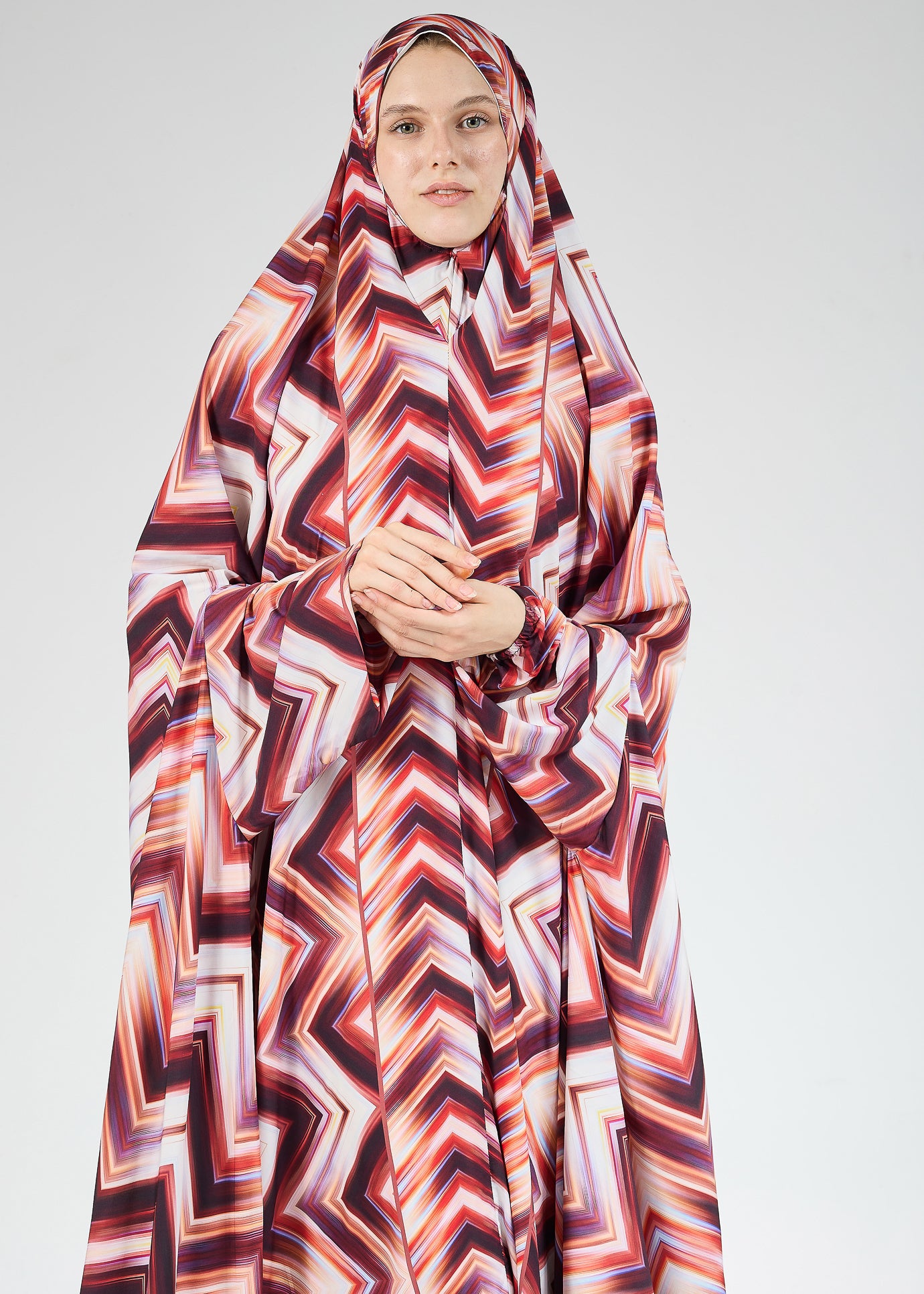 Detailed view of chevron print pattern on Satin Prayer Gown