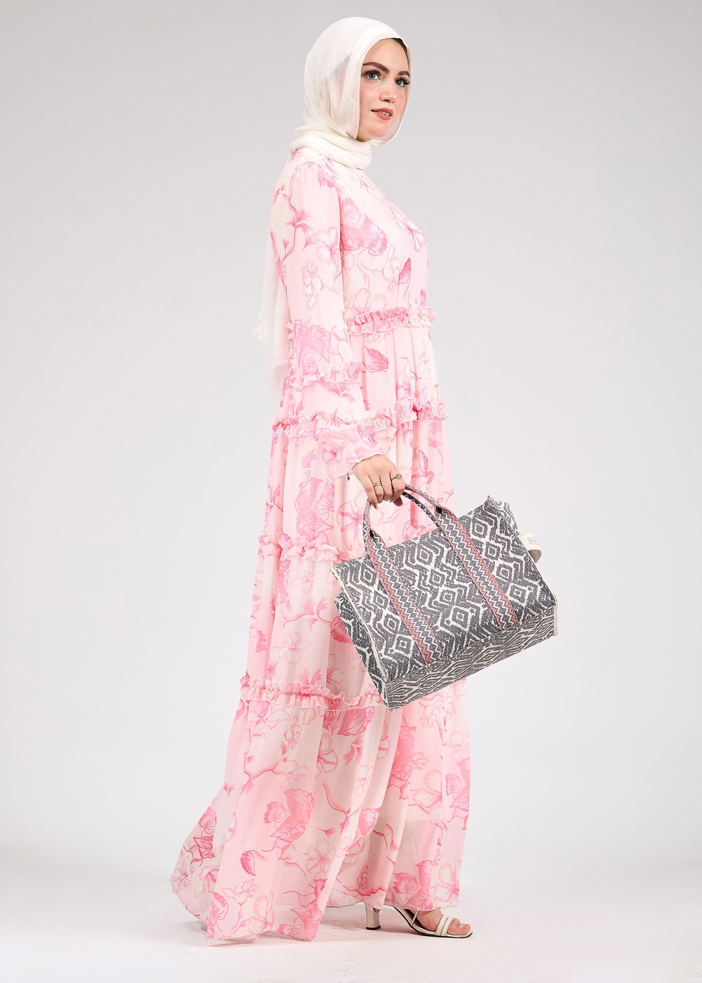 Close-up of the floral print and fabric on the delicate chiffon dress