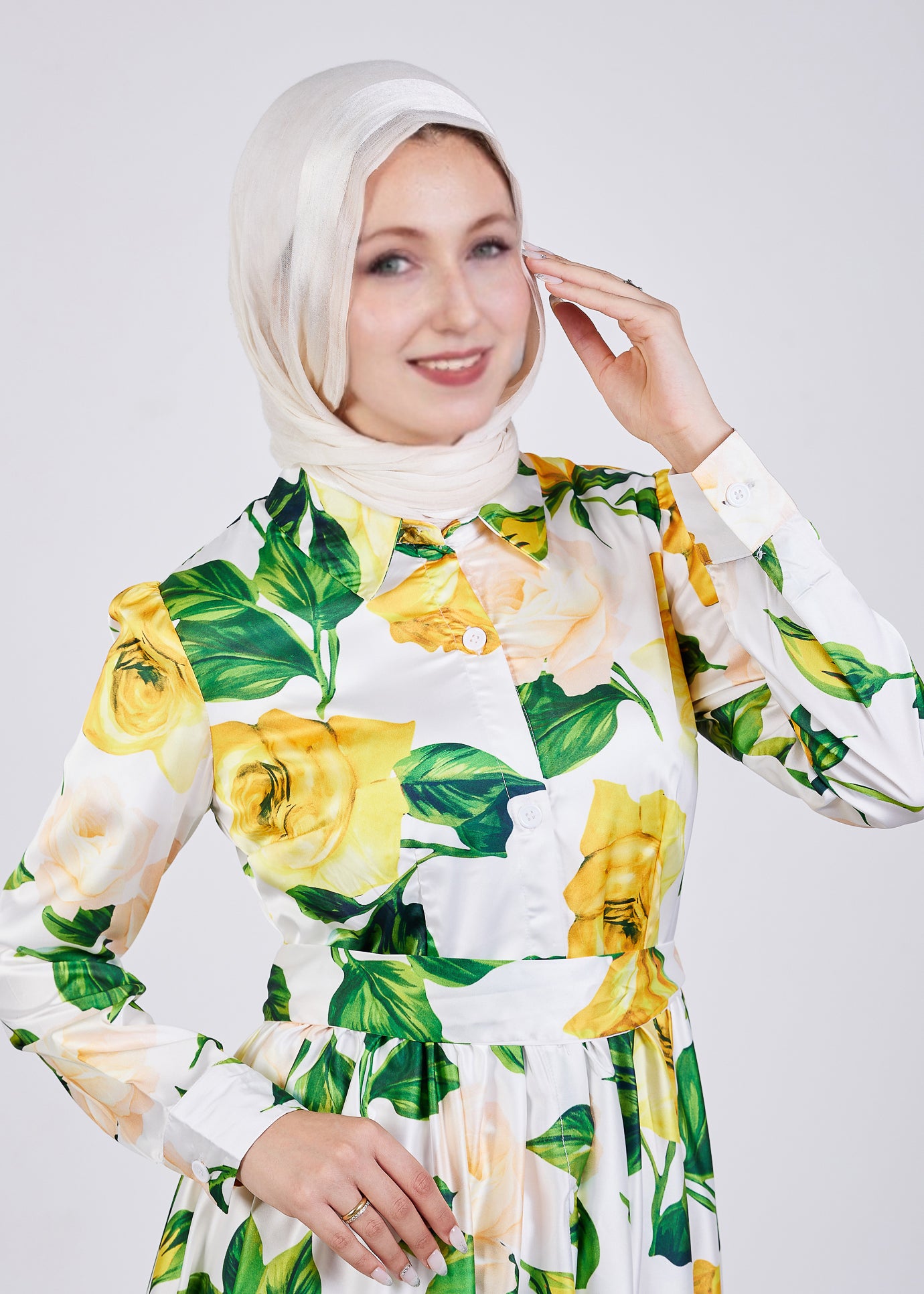 Flowing satin dress with yellow roses, showcasing the full look