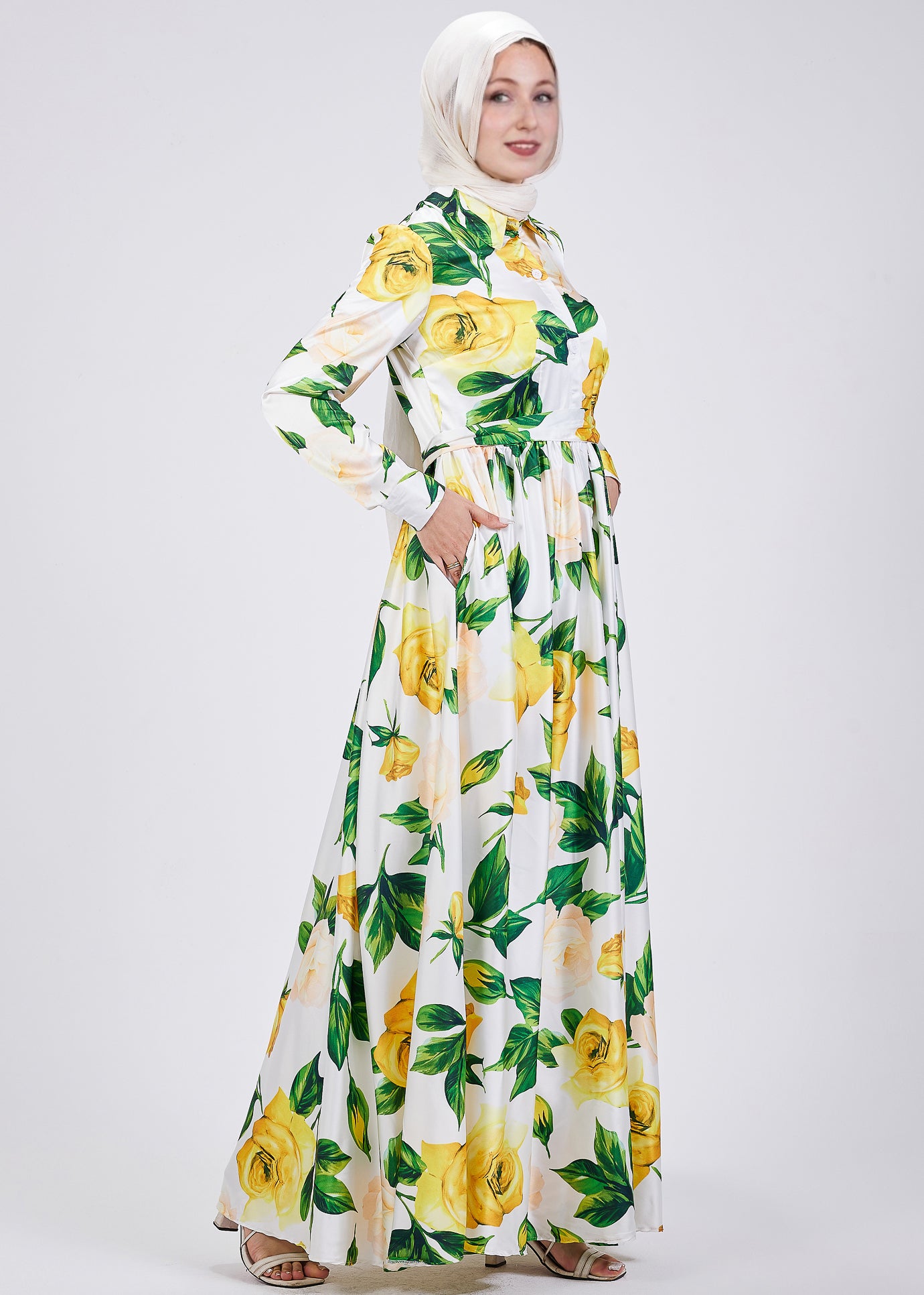 Tie-waist belt detail on the satin maxi dress with yellow roses