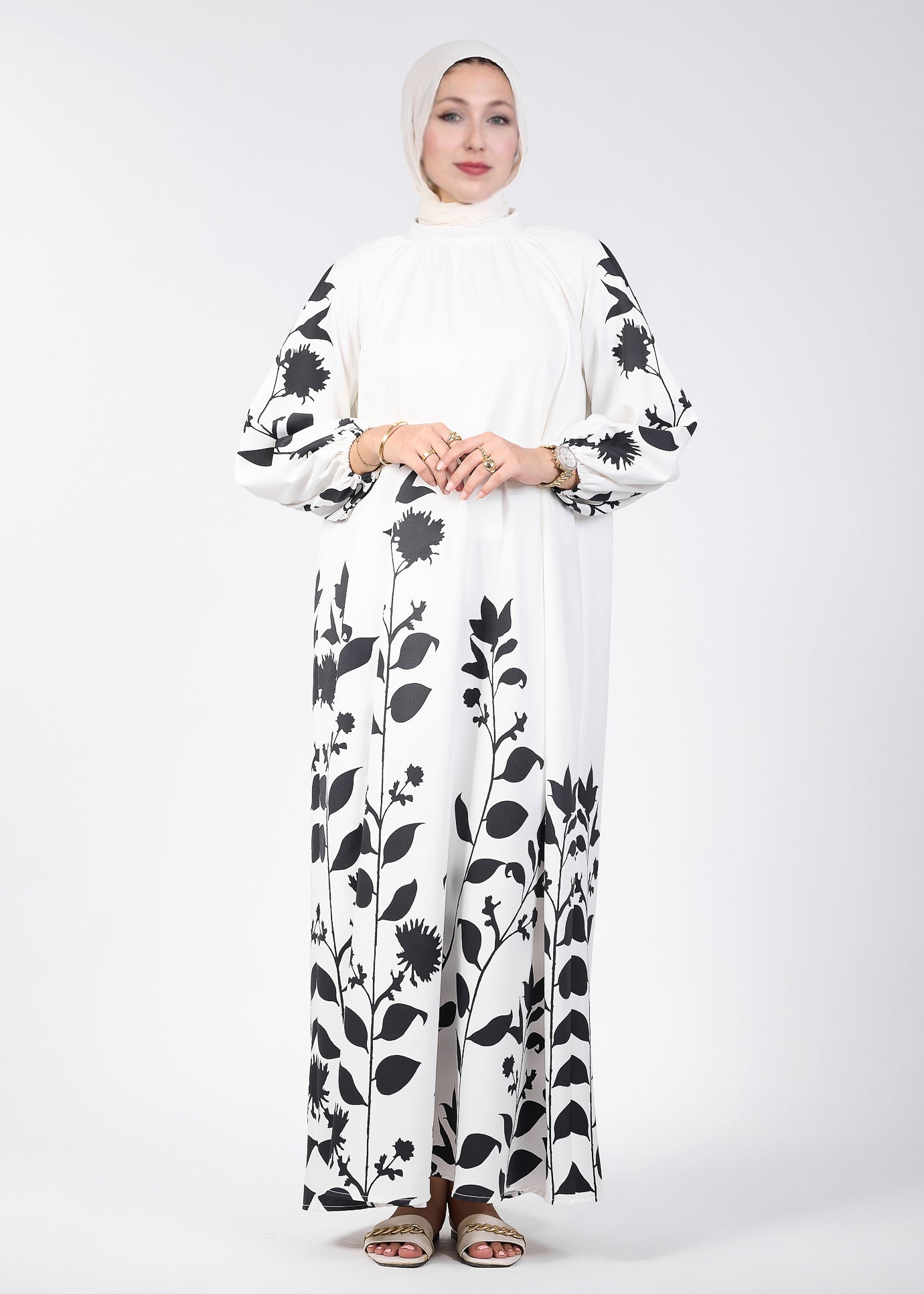 Side view of elegant floral printed maxi dress with raglan sleeves