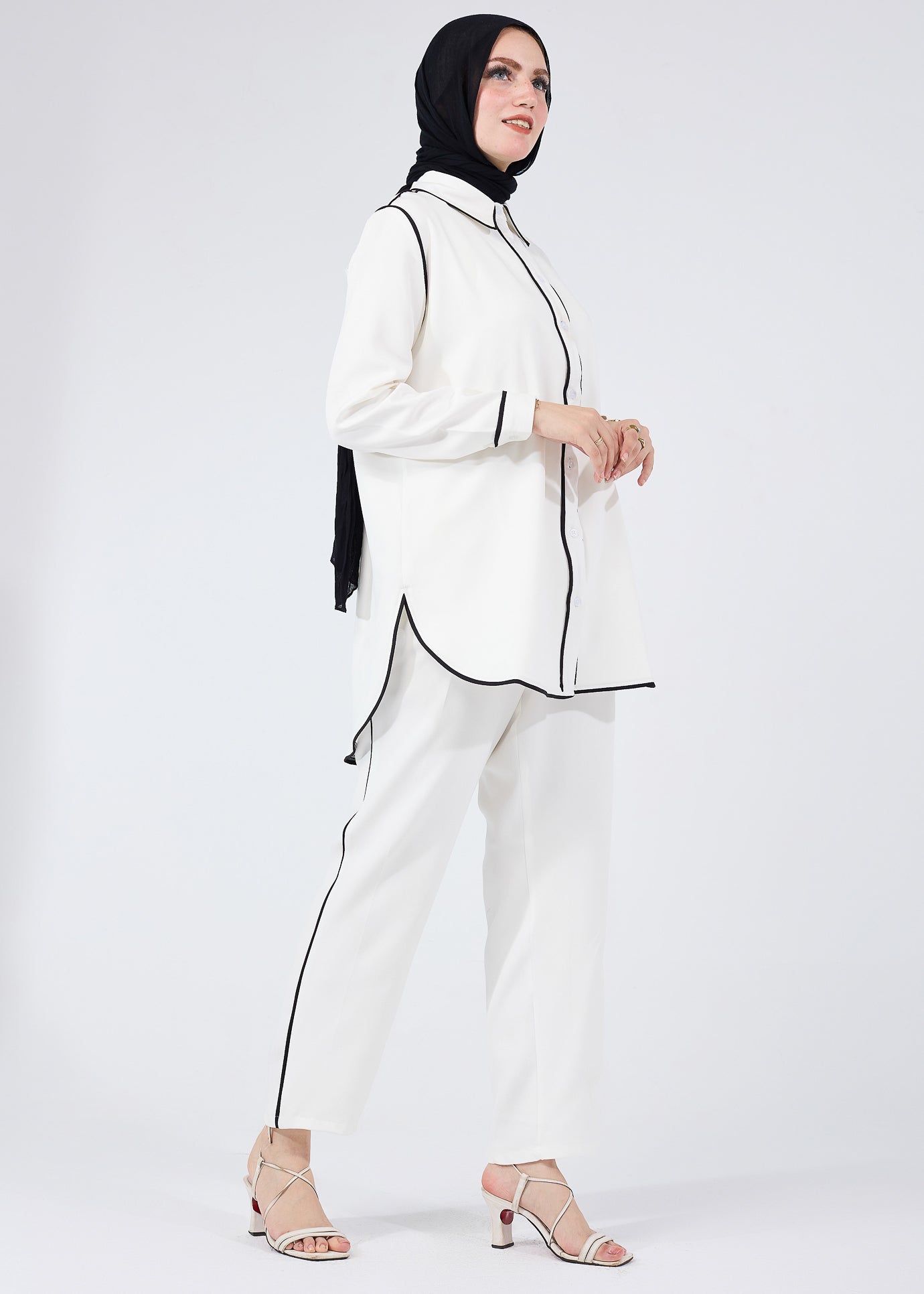 Elegant White Tunic with Black Piping Front View
