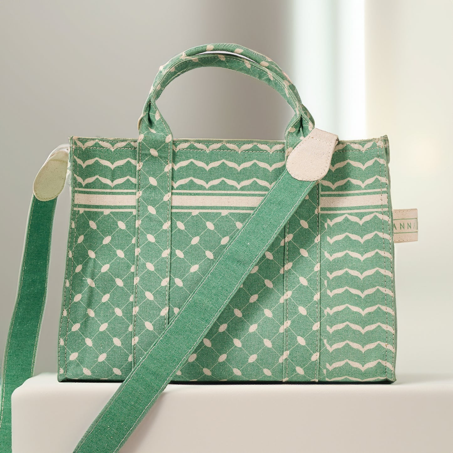 Model holding Emerald Green Keffiyeh Pattern Medium Tote