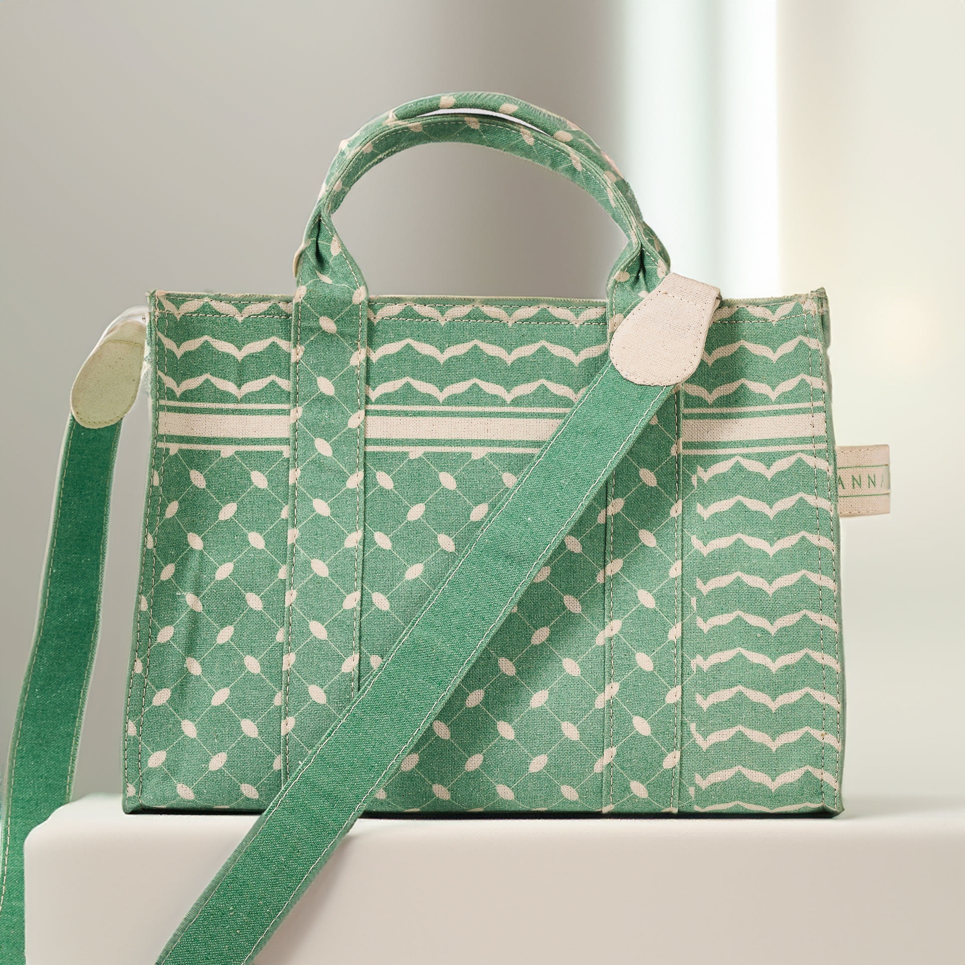 Model holding Emerald Green Keffiyeh Pattern Medium Tote