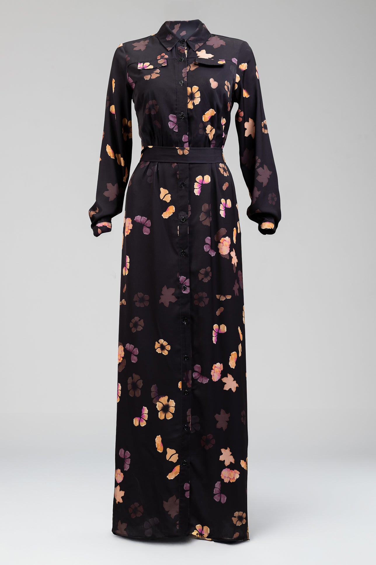 Flowing crepe fabric of Emina modesty dress in warm floral prints.
