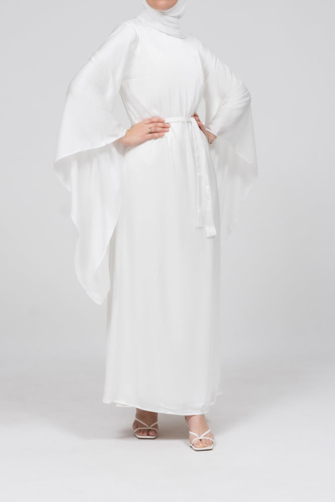 Flowing kimono sleeves of the ivory satin Nikah maxi dress