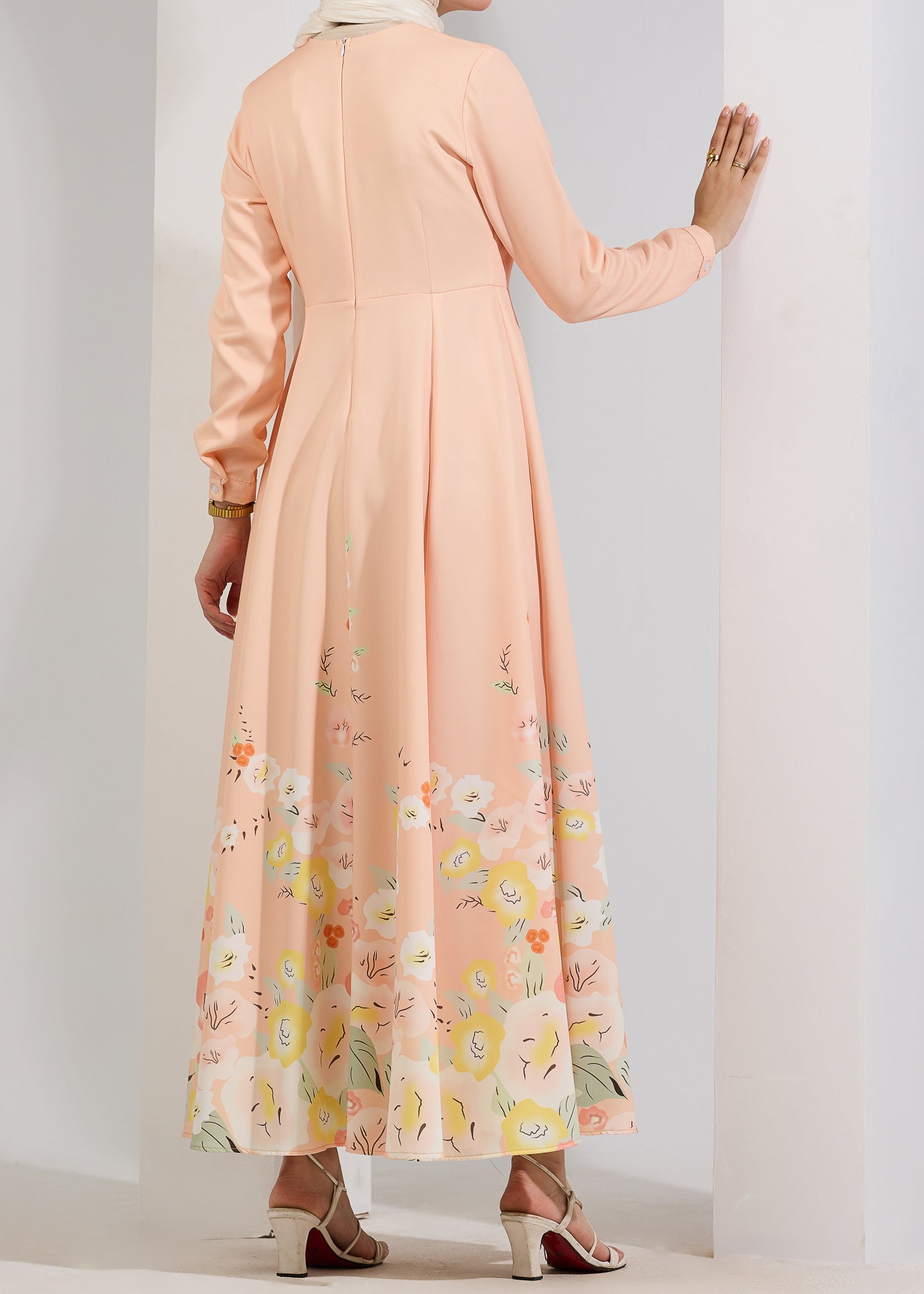 Back view of Ethereal Blush Floral Modest Maxi Dress with detailed floral hem