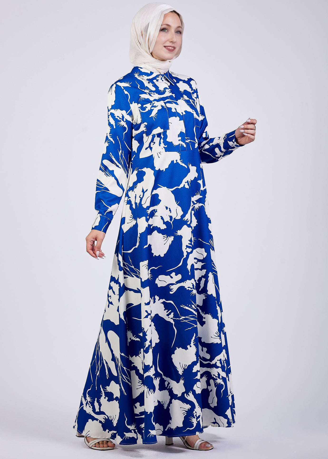 Front view of Evelyn Abstract Floral Crepe Maxi Dress holding the dress