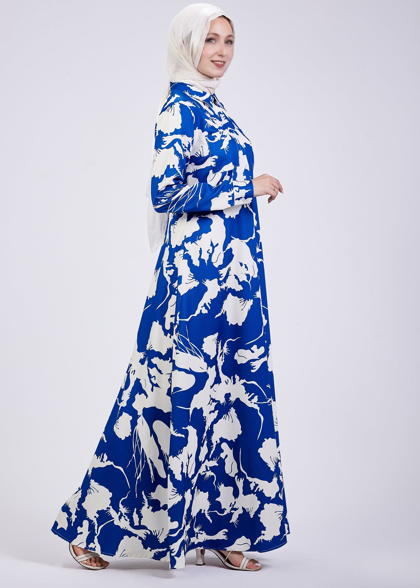 Front view of Evelyn Abstract Floral Crepe Maxi Dress with a smile