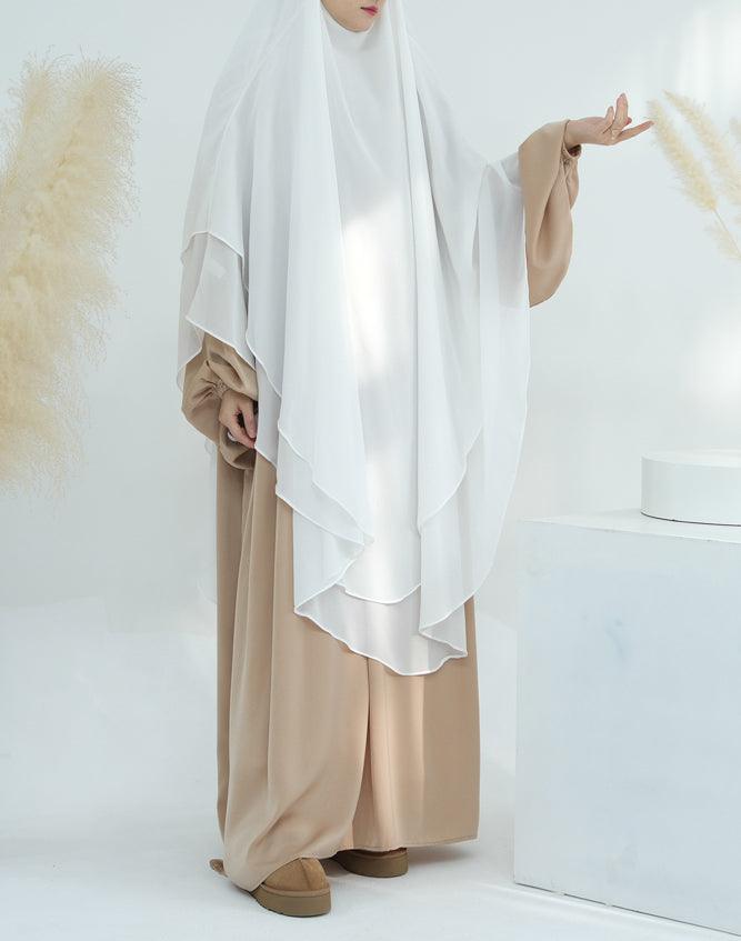 Extended length of the extra long white chiffon khimar showing its full coverage