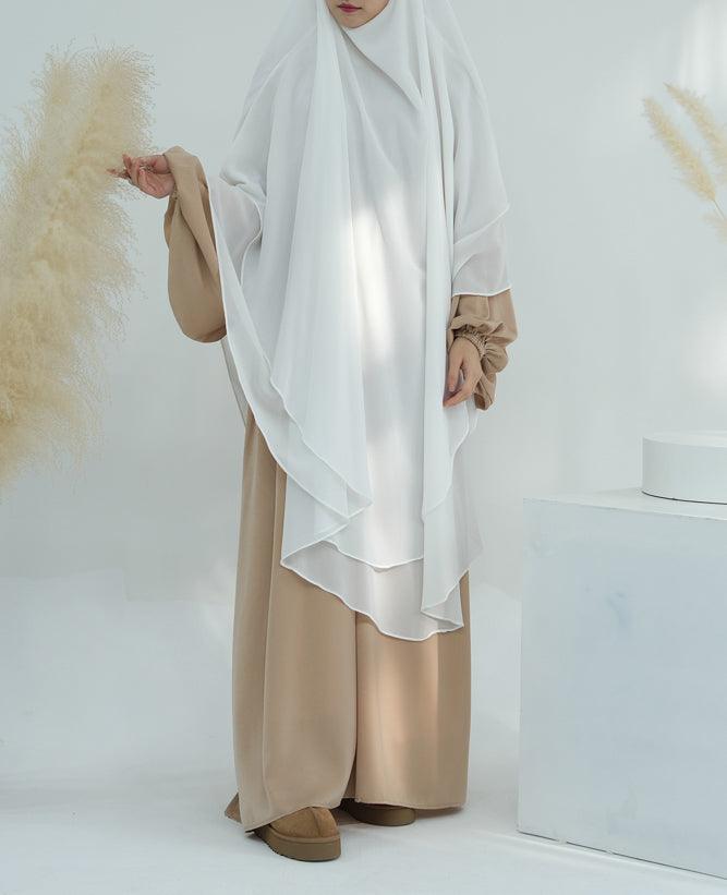 Versatile style of the extra long white chiffon khimar worn for different occasions