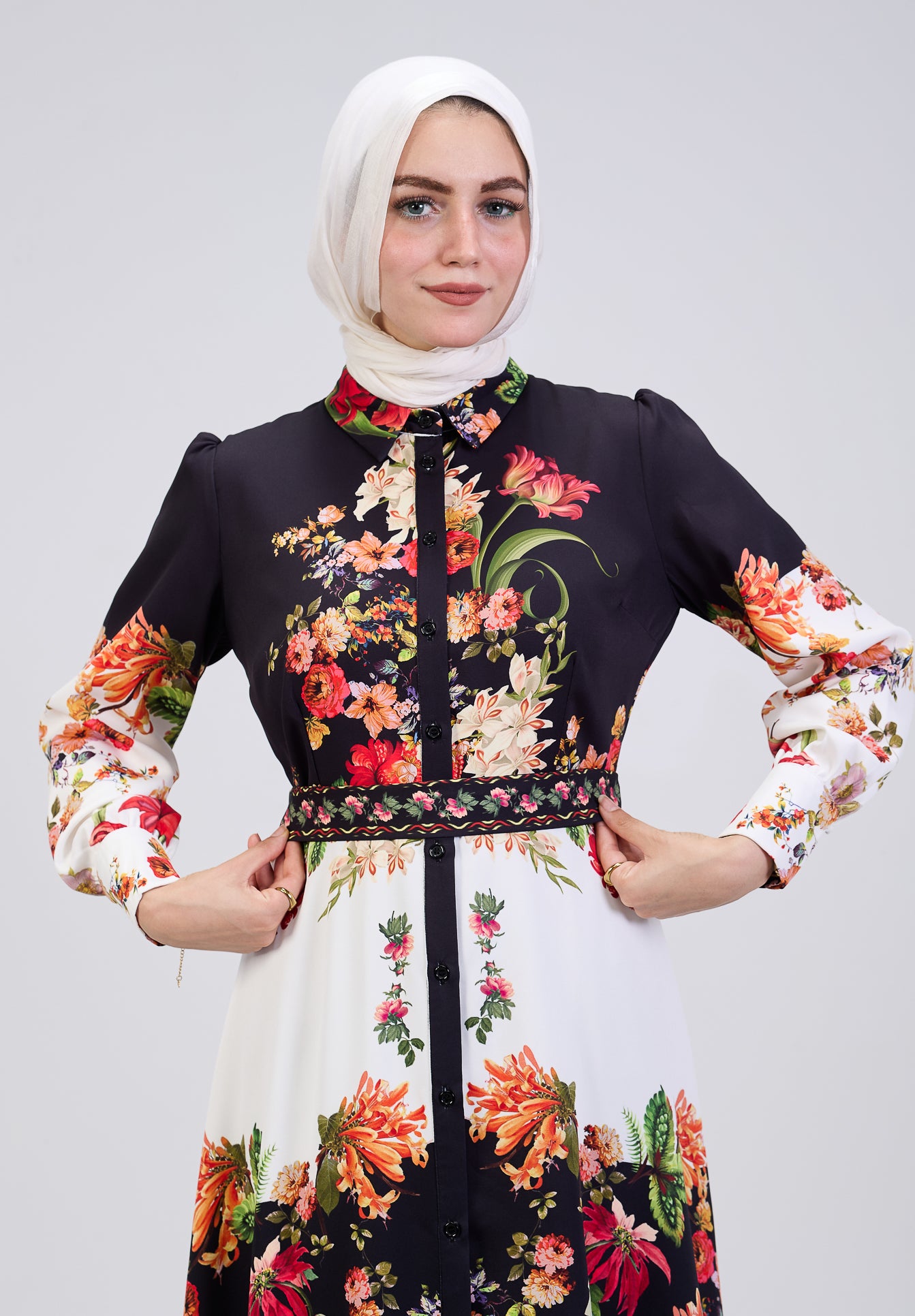 Cinched waist of floral button-down modesty dress