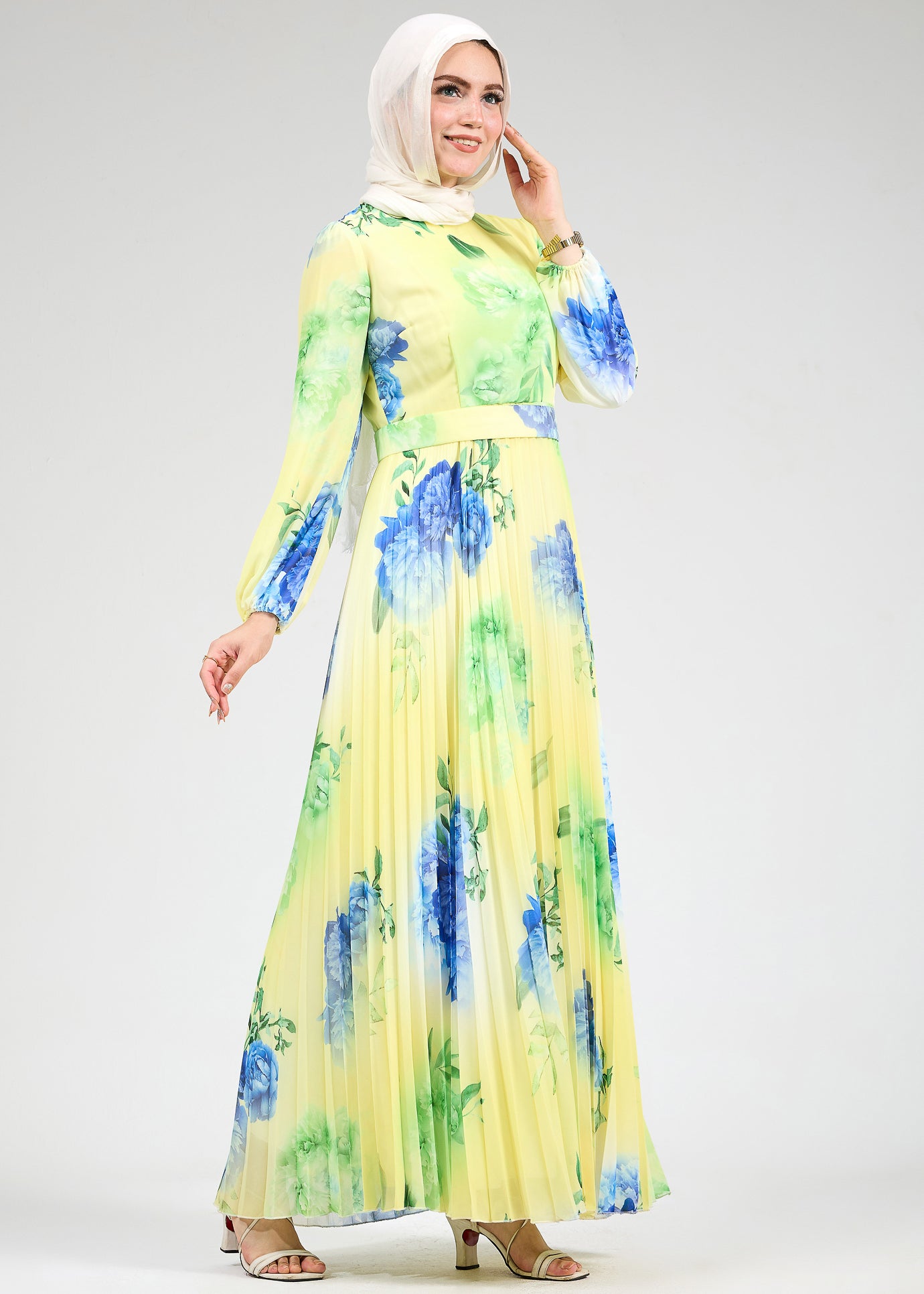 Back view of floral chiffon maxi dress with pleated skirt
