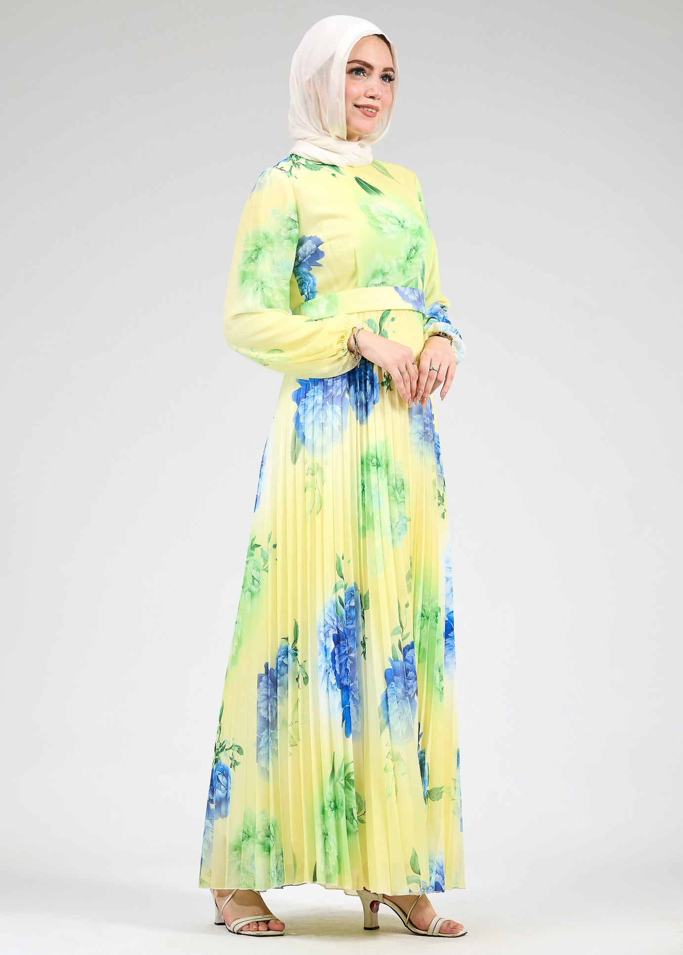 Full view of floral chiffon maxi dress worn by model
