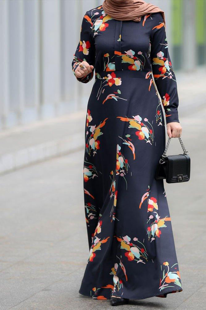 Close-up of the floral long-sleeve detailing on the Elegant Maxi Dress