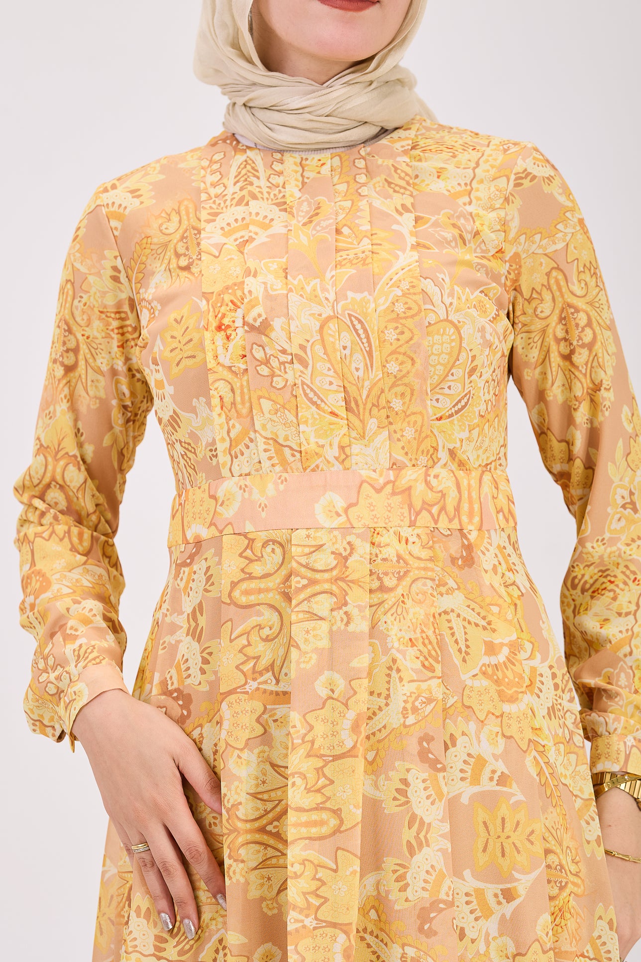 Close-up of floral details on hijab dress