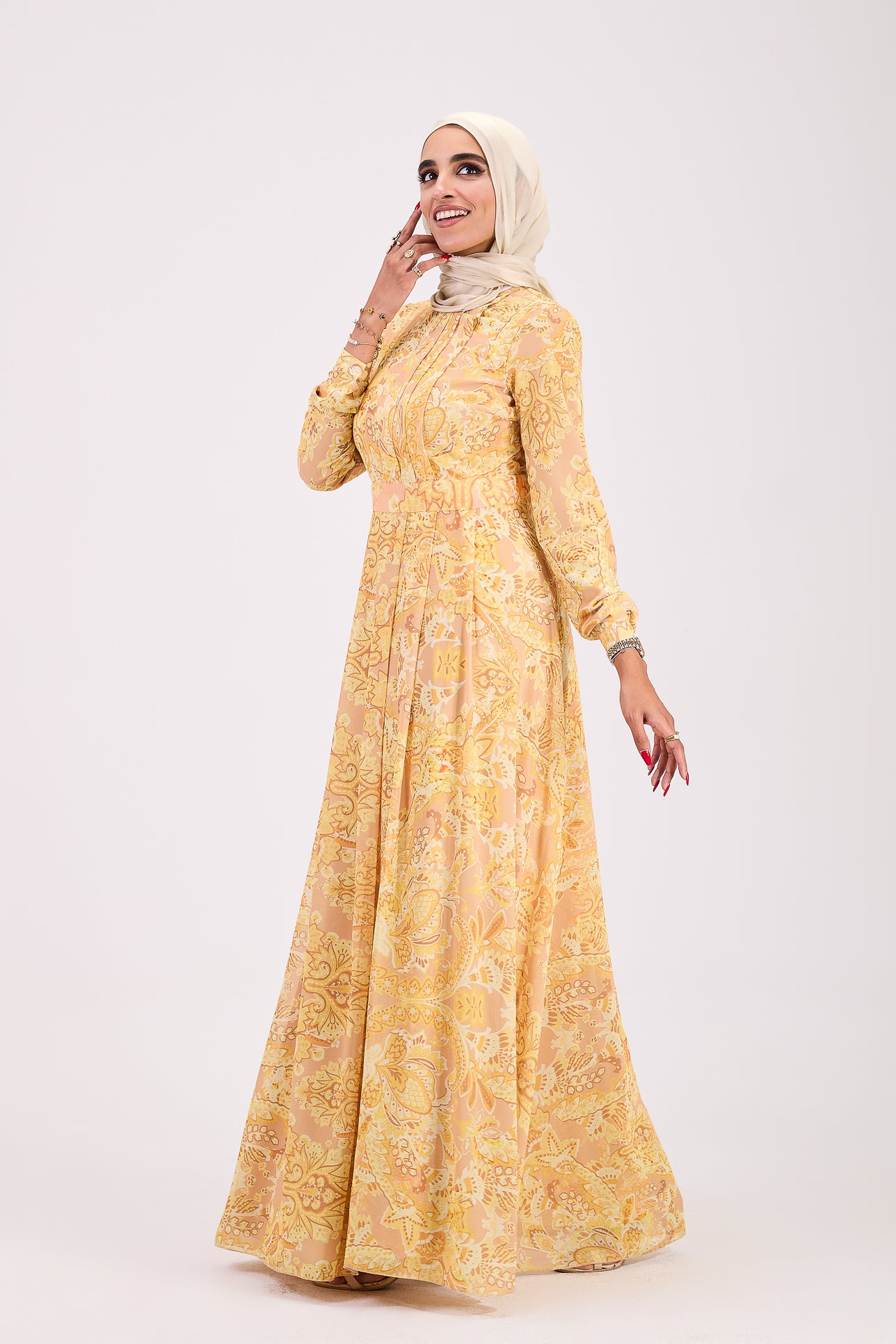 Side view of golden yellow floral hijab dress