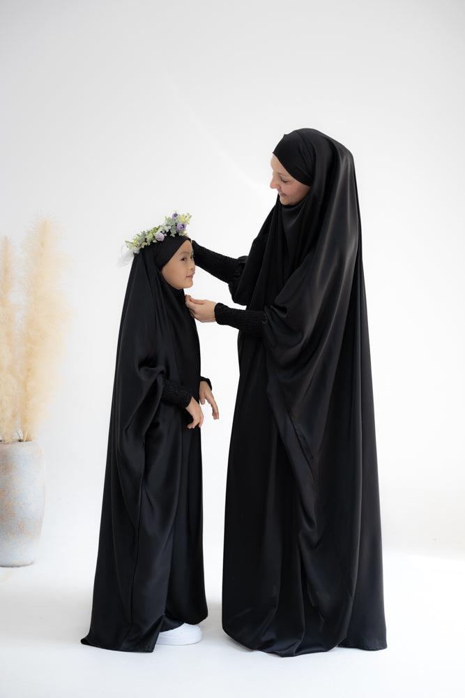 Gretaah prayer gown in khimar style with ribbed sleeve and lace cuff in Black - ANNAH HARIRI