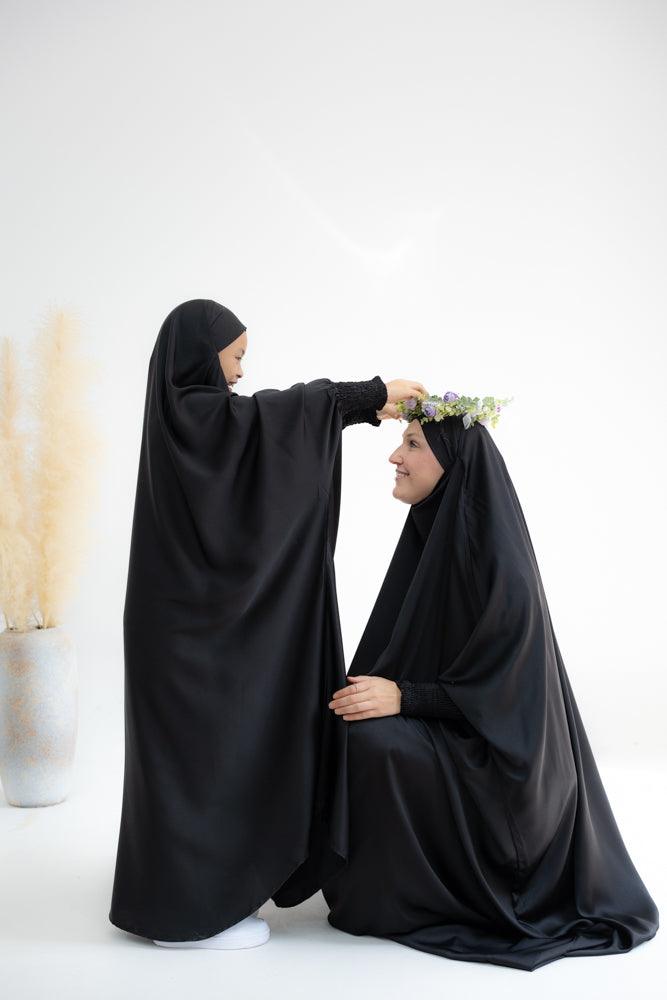 Gretaah prayer gown in khimar style with ribbed sleeve and lace cuff in Black - ANNAH HARIRI