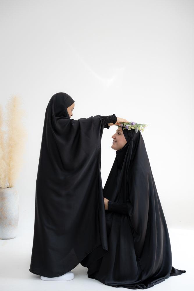 Gretaah prayer gown in khimar style with ribbed sleeve and lace cuff in Black - ANNAH HARIRI