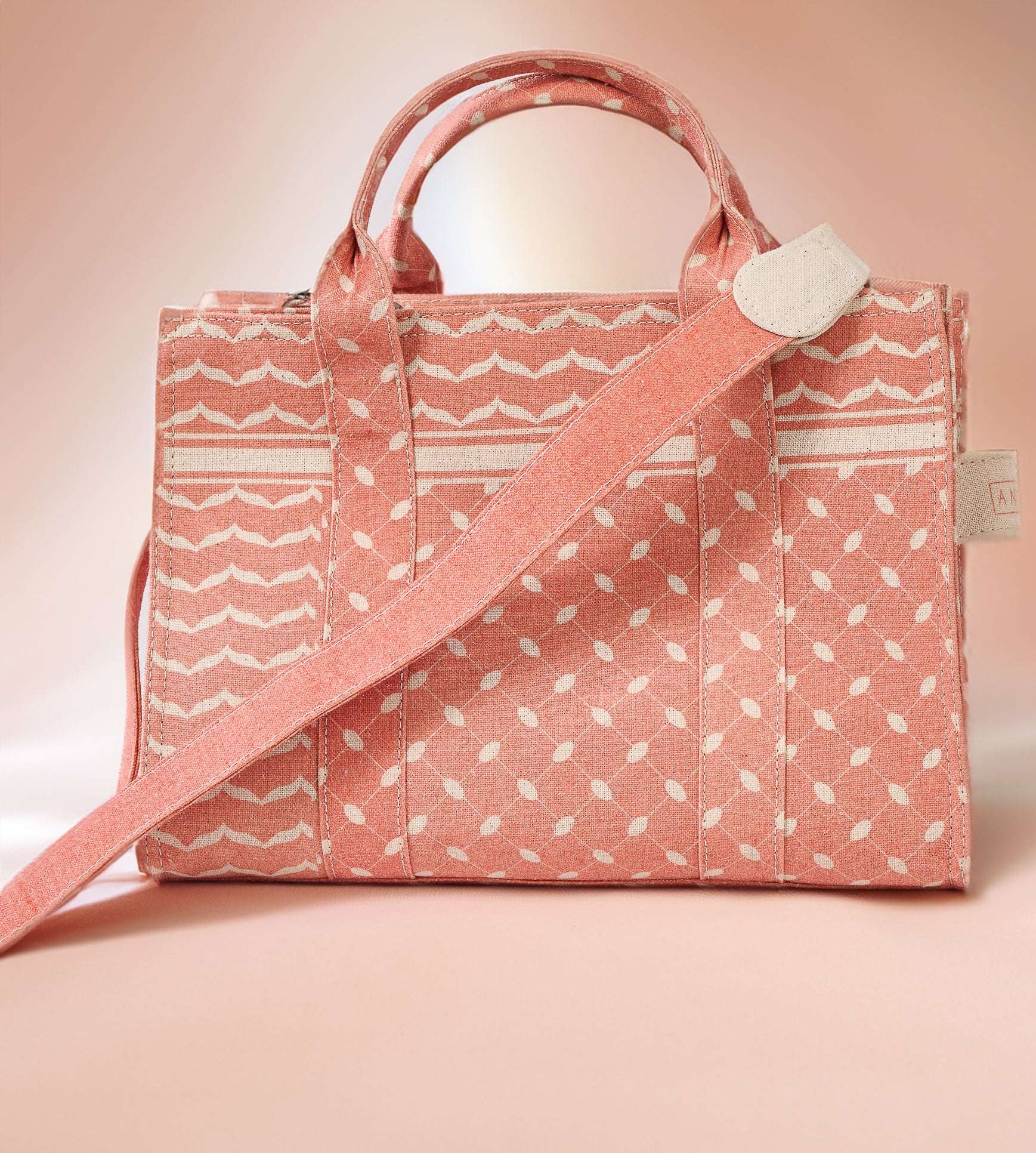 Back view of the Heritage Coral and Cream Medium Tote with Keffiyeh pattern