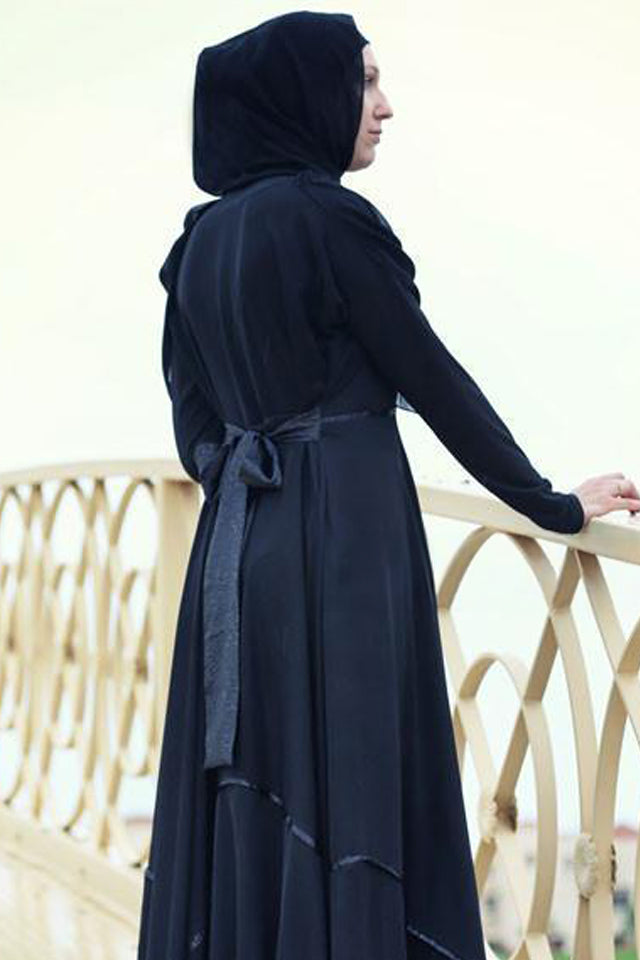 Black abaya featuring a high collar