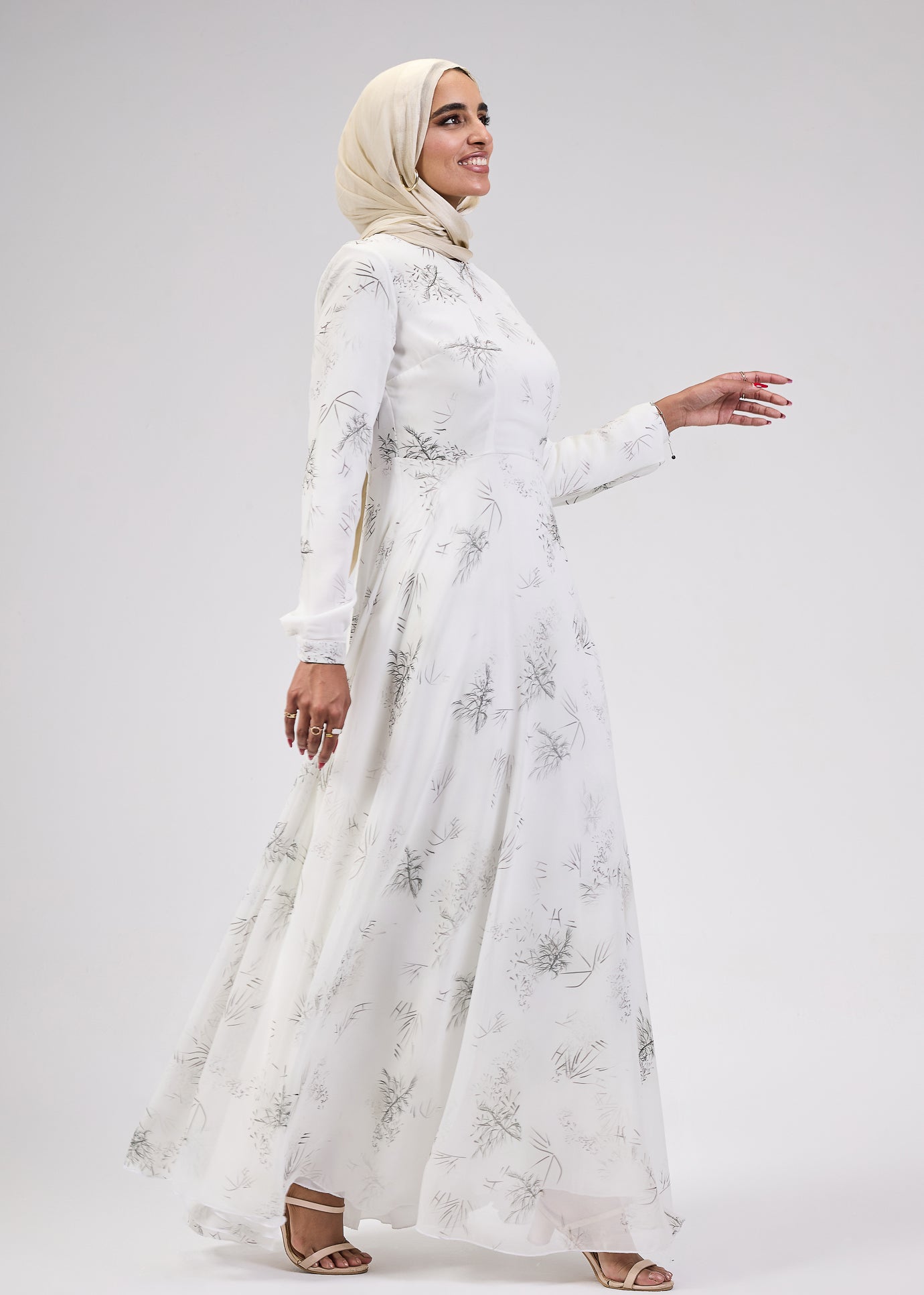 Model wearing Ivory Chiffon Maxi Dress with hijab