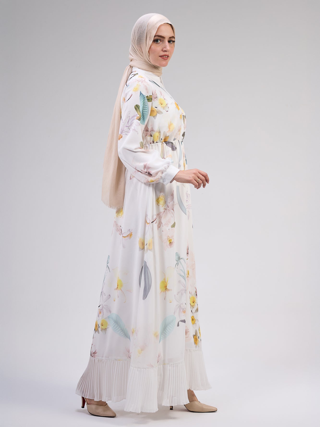 Button detailing on the ivory chiffon floral maxi dress