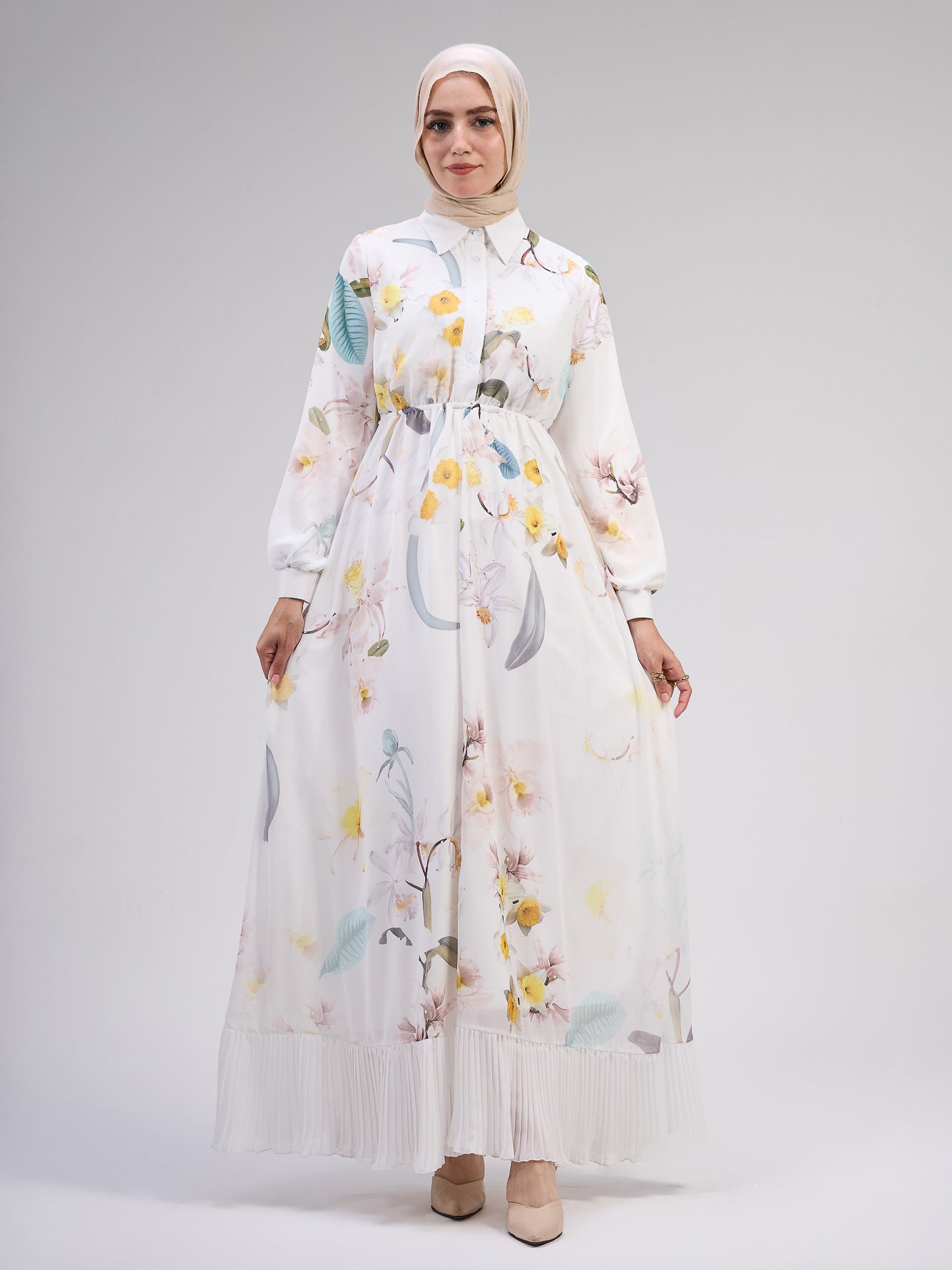 Flowing skirt design of the ivory floral chiffon dress