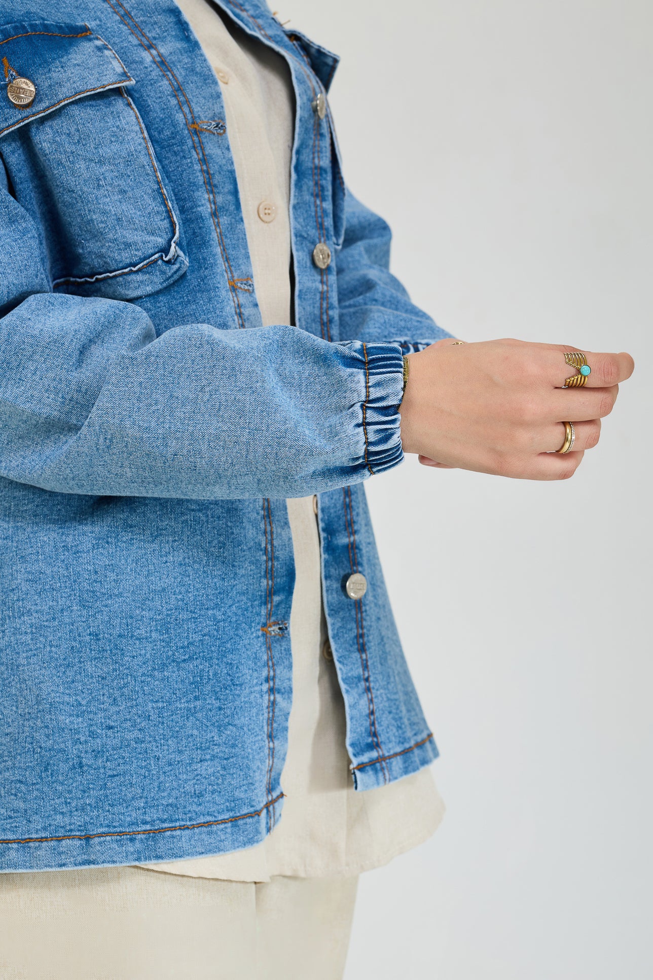 Button details on the jean maxi jacket