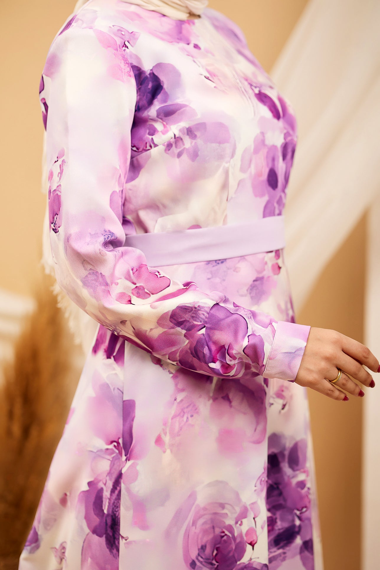 Close-up of the sleeve and floral print on the Lavender Crepe Polyester Maxi Dress