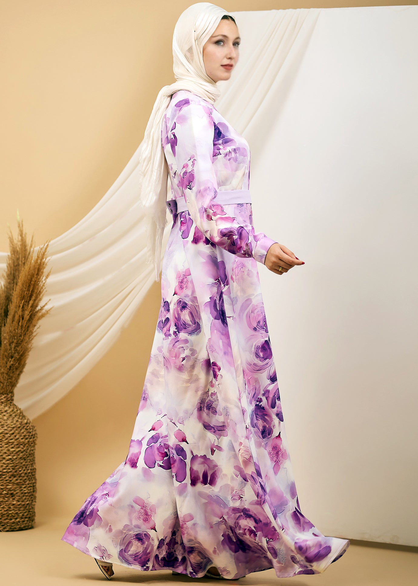 Side view of the Lavender Floral Crepe Polyester Maxi Dress highlighting the flowing skirt