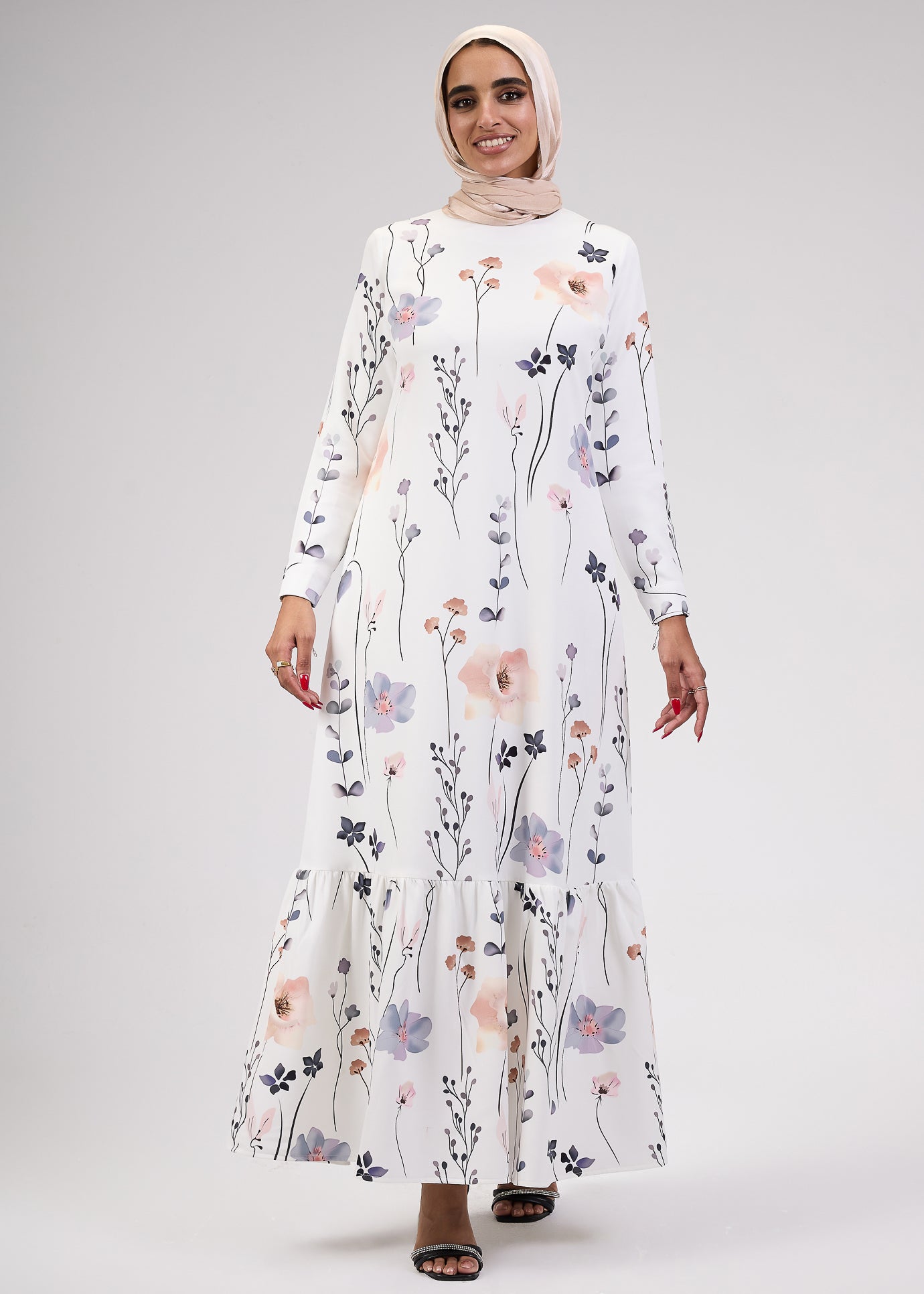 Accessorized look of Lily Bloom Modesty Dress in floral print
