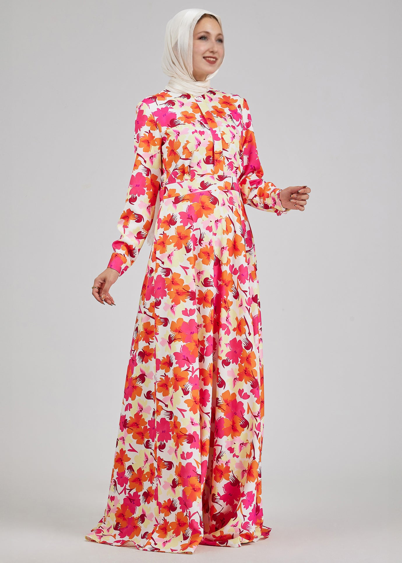 Side view of the Lumiere Floral Maxi Dress showing the buttoned front and cuffed sleeves