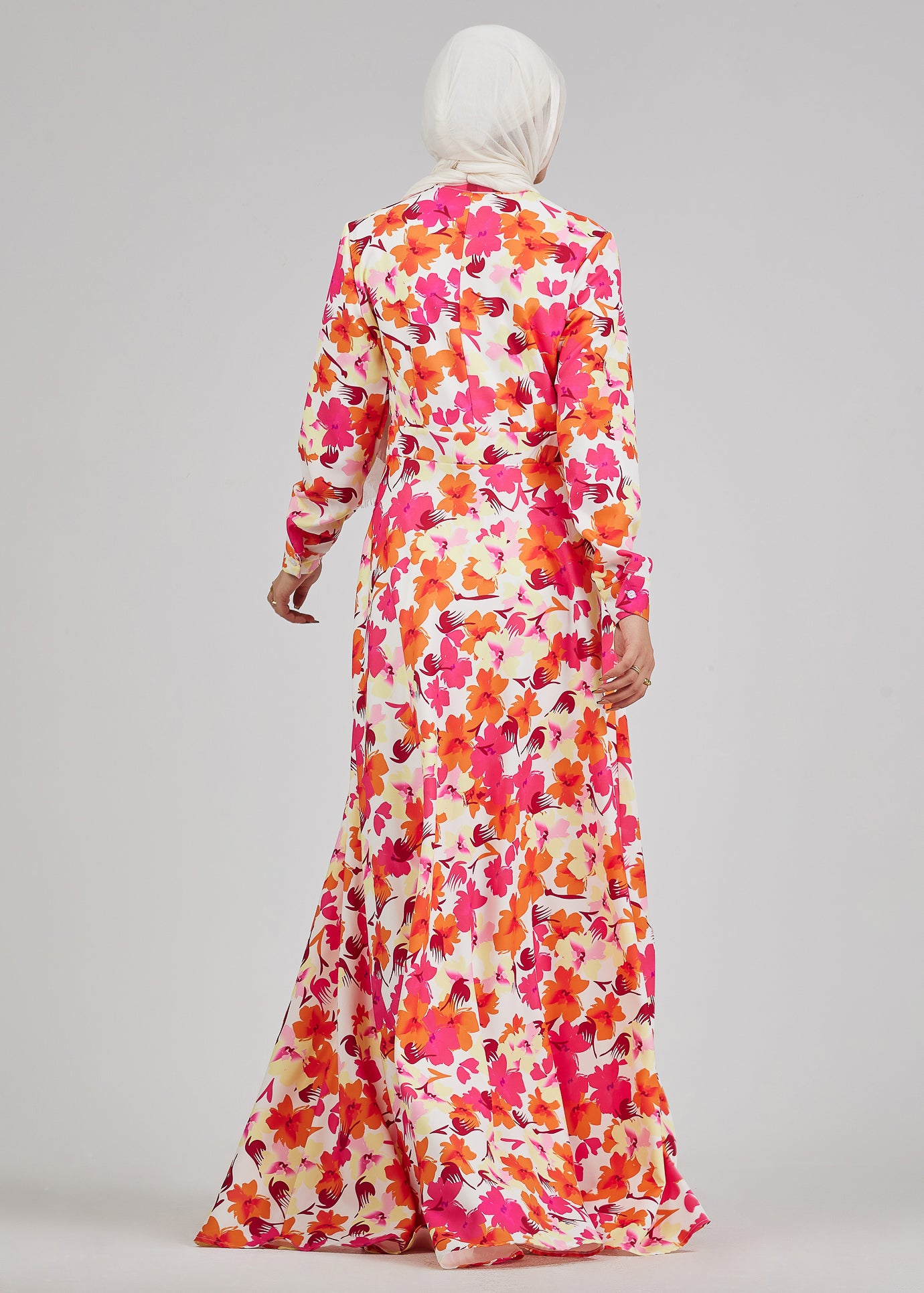 Cuffed sleeve detail of the Lumiere Floral Maxi Dress