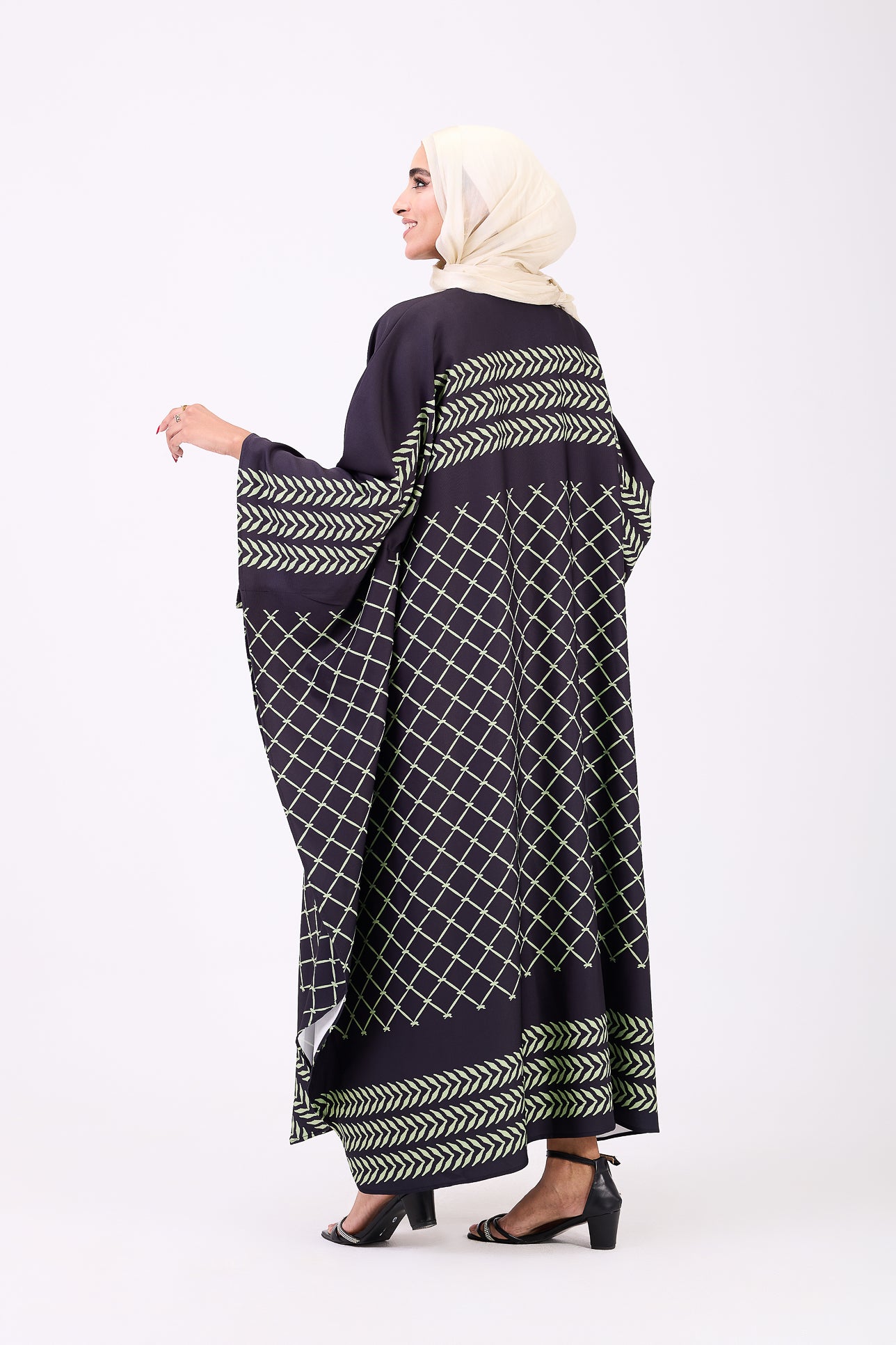 Back view of maxi dress in crepe with geometric accents