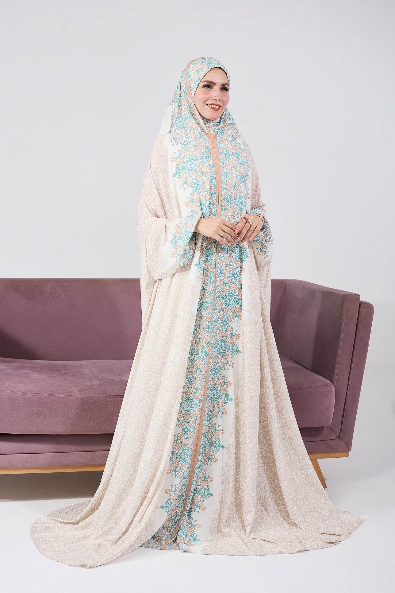 Front view of luxurious satin prayer gown in floral print
