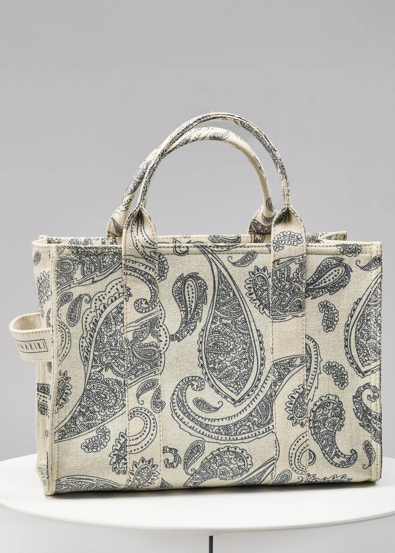 Close-up of zip closure on Paisley Print Canvas Tote
