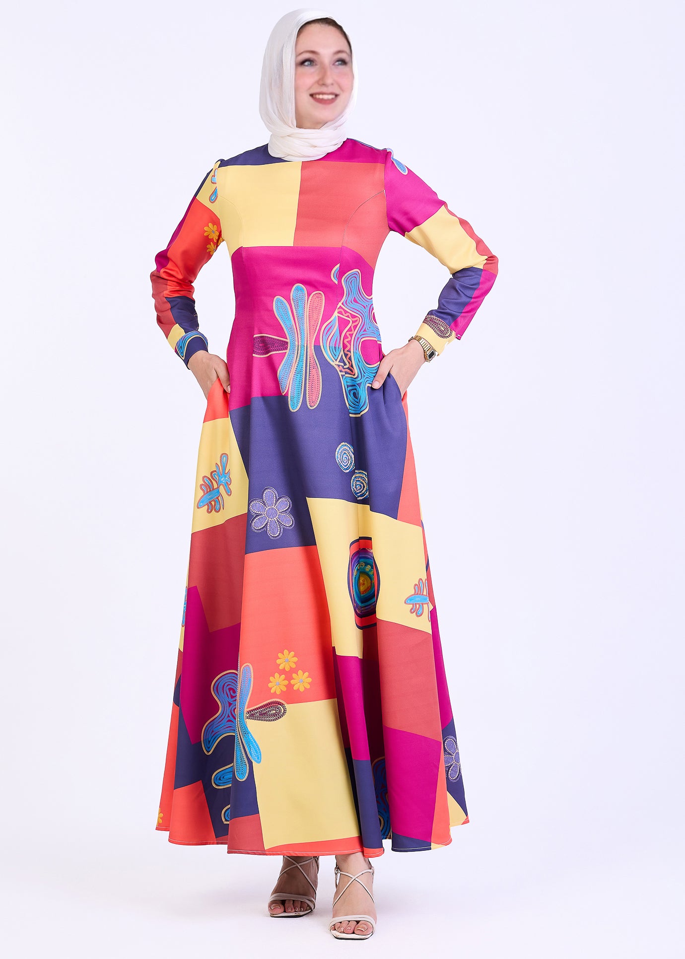 Front view of vibrant patchwork crepe maxi dress with abstract print