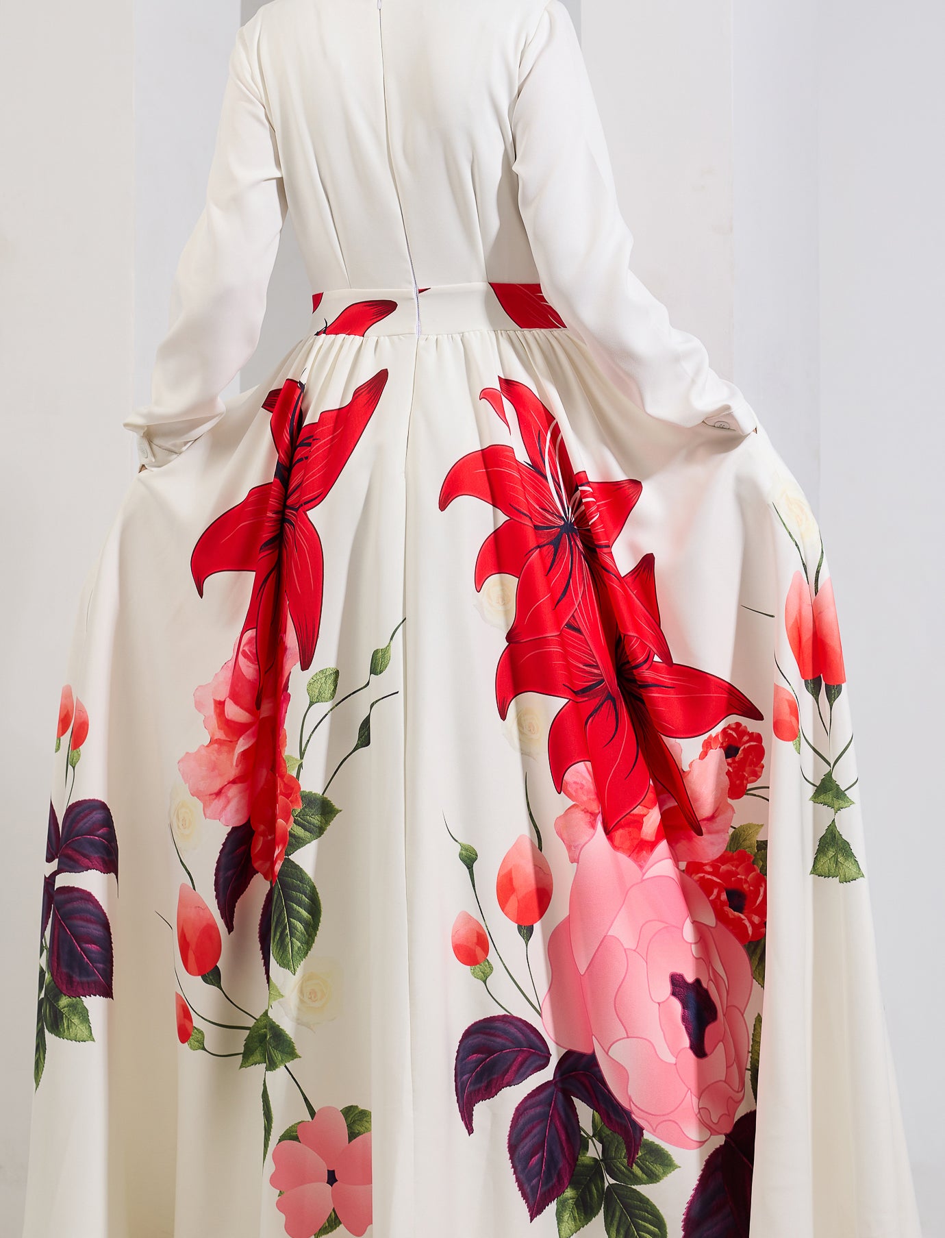 A back view of the Radiant Blossom Crepe Maxi Dress, displaying the full length and floral details.