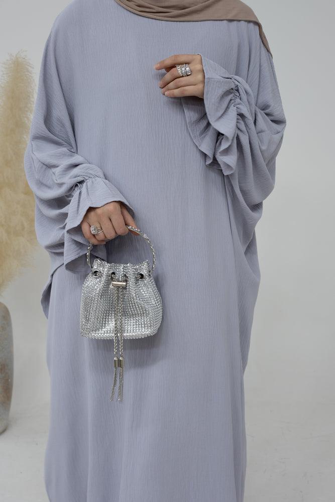 Radwa batwing abaya with ruched sleeve and loose cut in light grey - ANNAH HARIRI