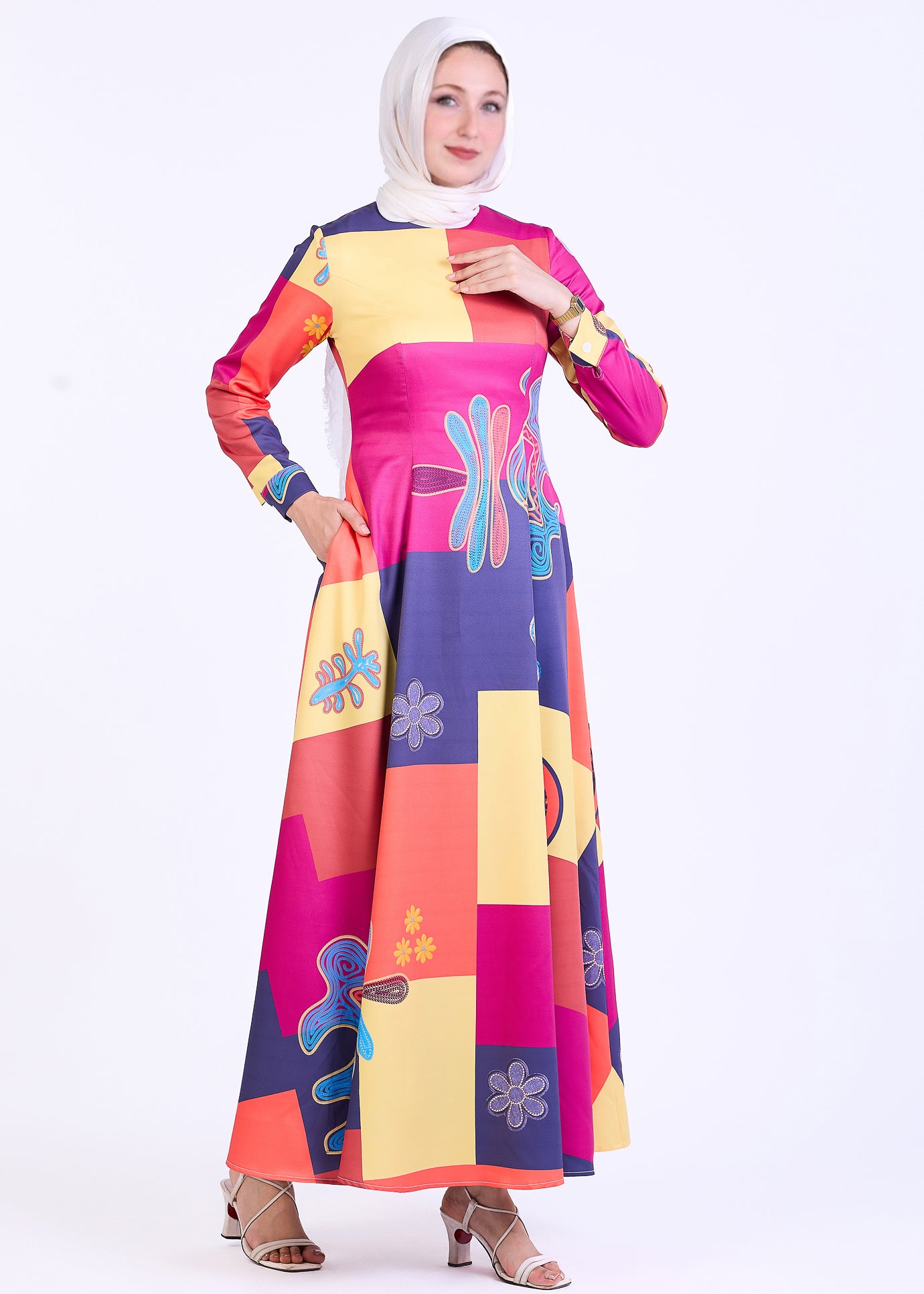 Side view of vibrant patchwork crepe maxi dress with abstract print